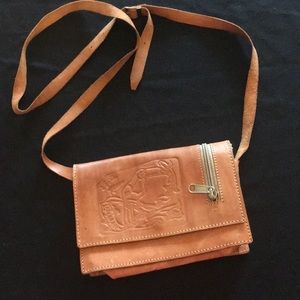 Vintage hand tooled leather cross body bag